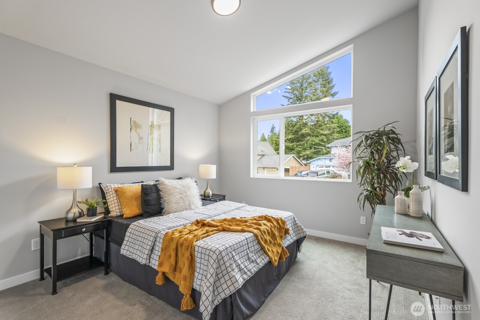 10024 Northeast 196th Place Bothell, WA 98011 - Photo 28 of 40 a bedroom with a bed and a window
