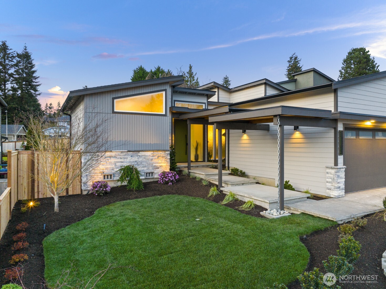 10024 Northeast 196th Place Bothell, WA 98011 - Photo 3 of 40 a view of a house with backyard and sitting area