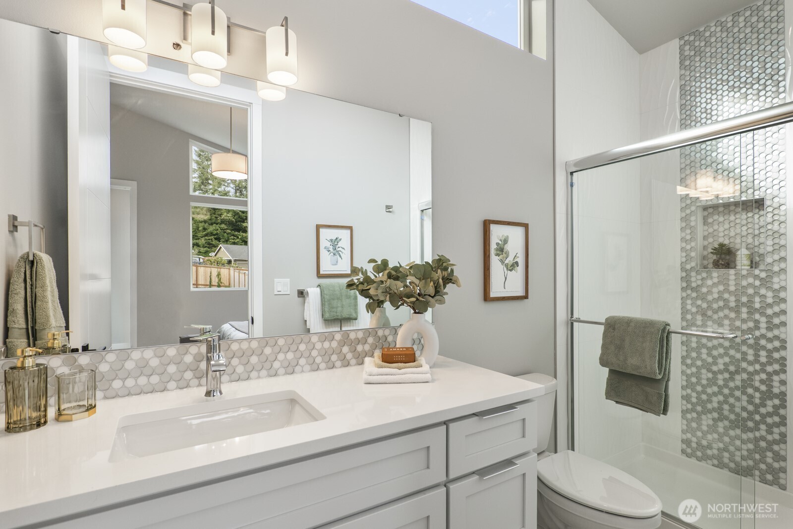 10024 Northeast 196th Place Bothell, WA 98011 - Photo 34 of 40 a bathroom with a sink vanity granite toilet and a mirror