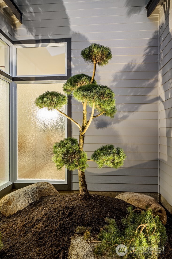 10024 Northeast 196th Place Bothell, WA 98011 - Photo 36 of 40 a vase of flowers sitting on a table