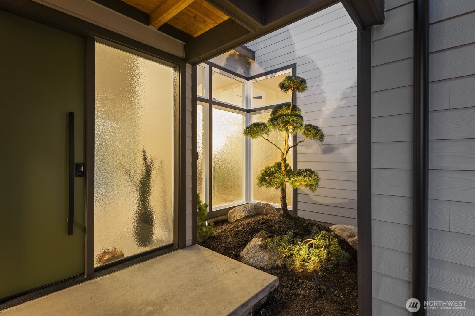 10024 Northeast 196th Place Bothell, WA 98011 - Photo 5 of 40 a bedroom with a bed and a window