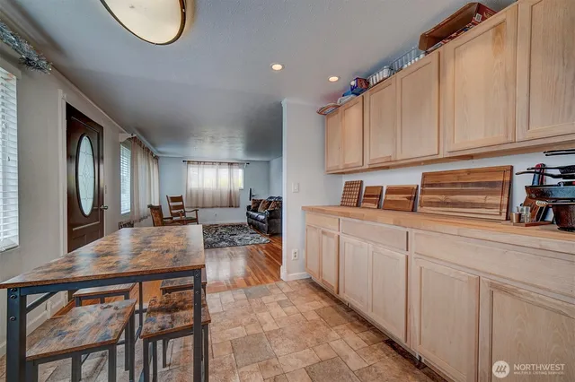 a kitchen with sink cabinets and appliances