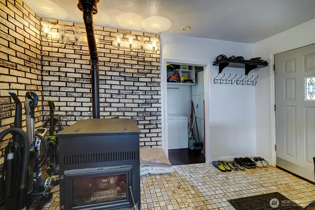 a bathroom with a shower and a sink