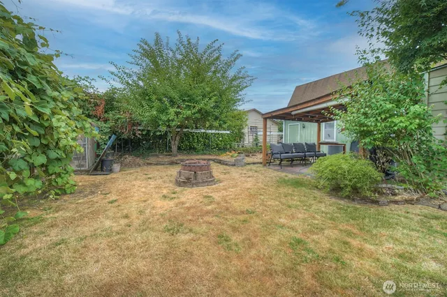 a backyard of a house with lots of green space
