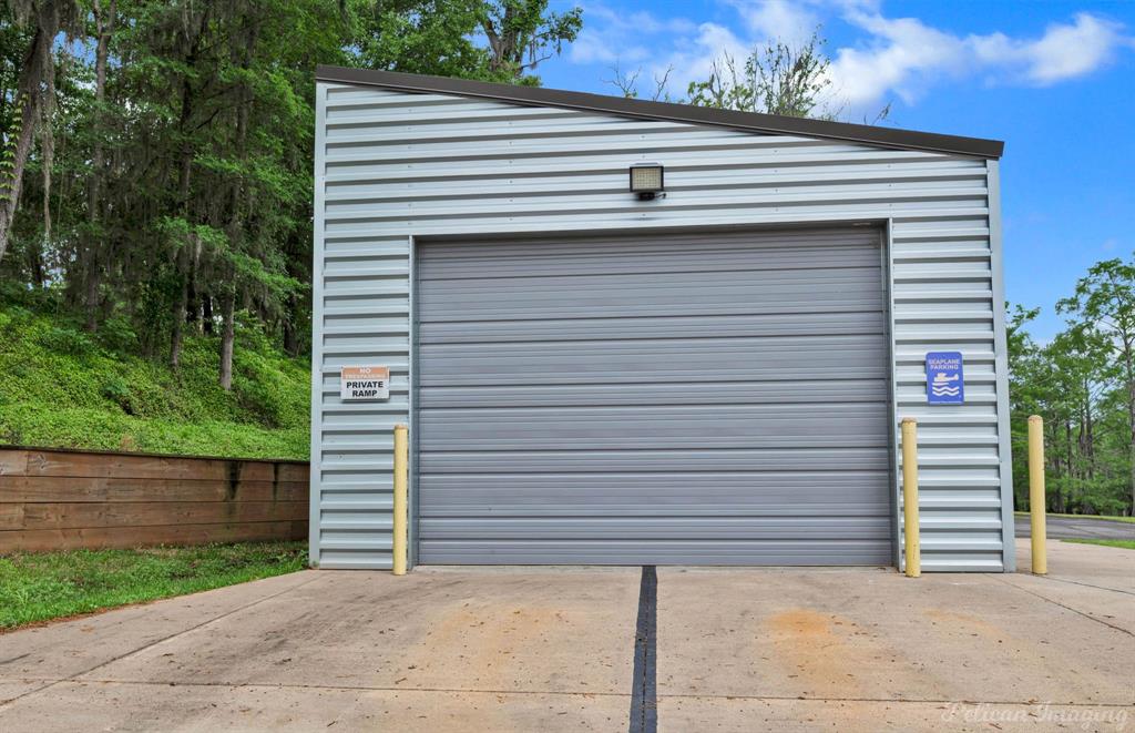 649 Moore Road Elm Grove, LA 71051 - Photo 12 of 13 a view of small house with a garage