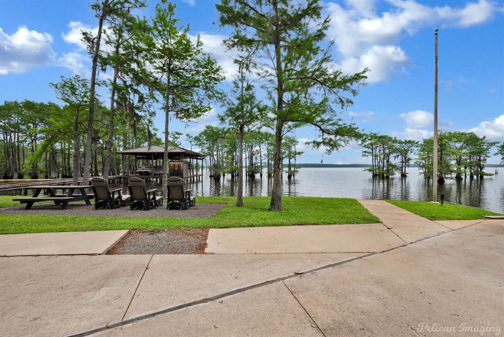 649 Moore Road Elm Grove, LA 71051 - Photo 10 of 13 a view of a yard with cars parked in front of it