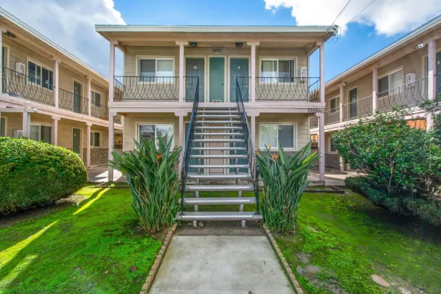 a house view with a garden space