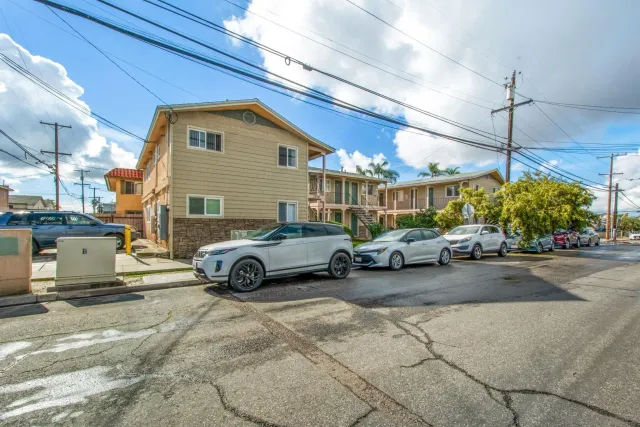 a view of a cars in front of a house