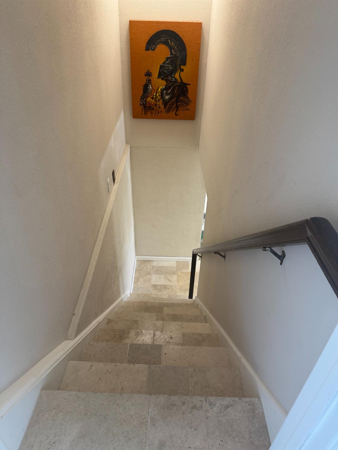 6619 Carver Road Modesto, CA 95356 - Photo 53 of 61 Travertine stone staircase going down to the finished basement.