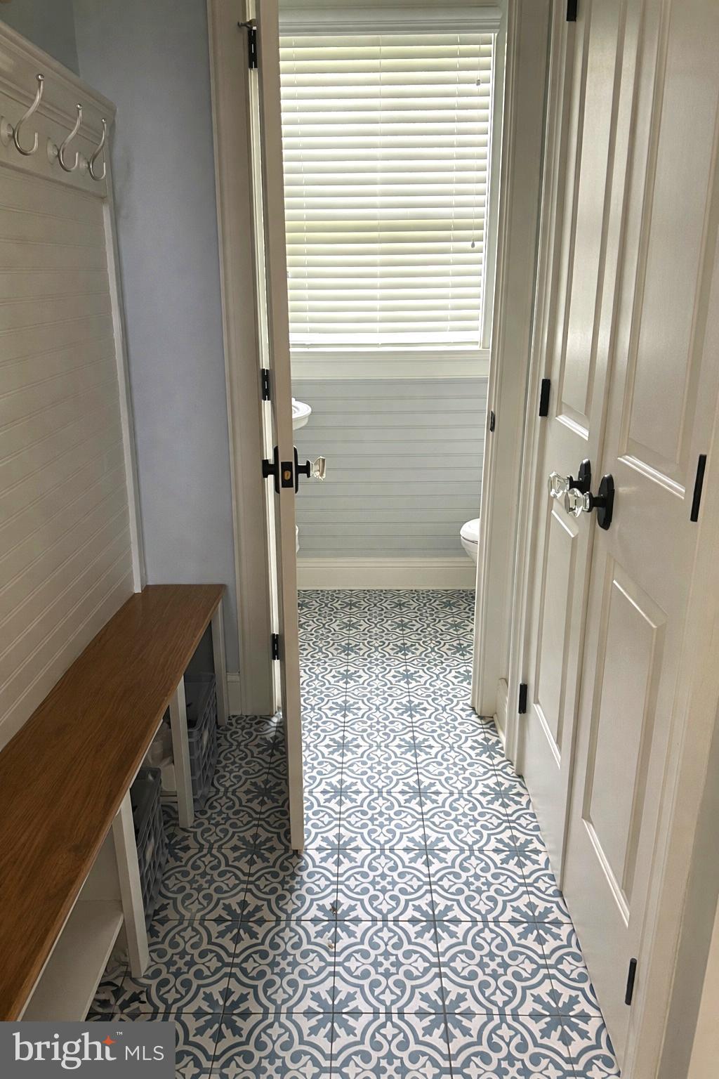 200 West Wayne Avenue, Unit 5 Wayne, PA 19087 - Photo 5 of 12 Mudroom and Powder Room
