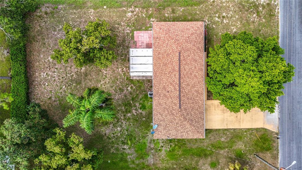 11034 Cranston Street Spring Hill, FL 34608 - Photo 39 of 40 an aerial view of a house with a yard