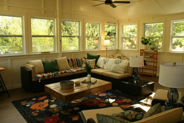 a view of a livingroom with furniture and wooden floor
