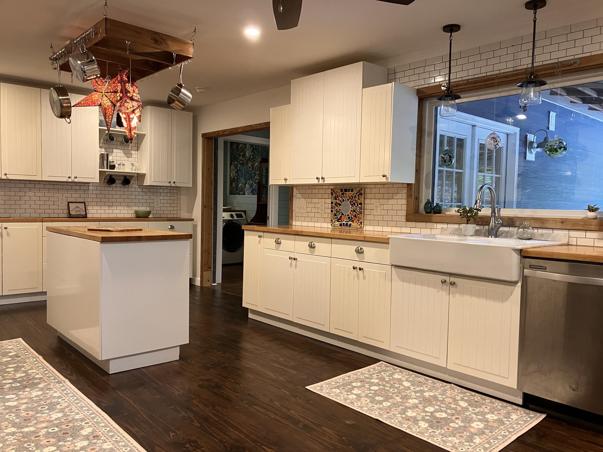 264 Ball Park Road Sewanee, TN 37375 - Photo 27 of 67 a kitchen with a sink window and cabinets