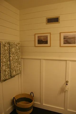 a spacious bedroom with a balcony a bed and a couch