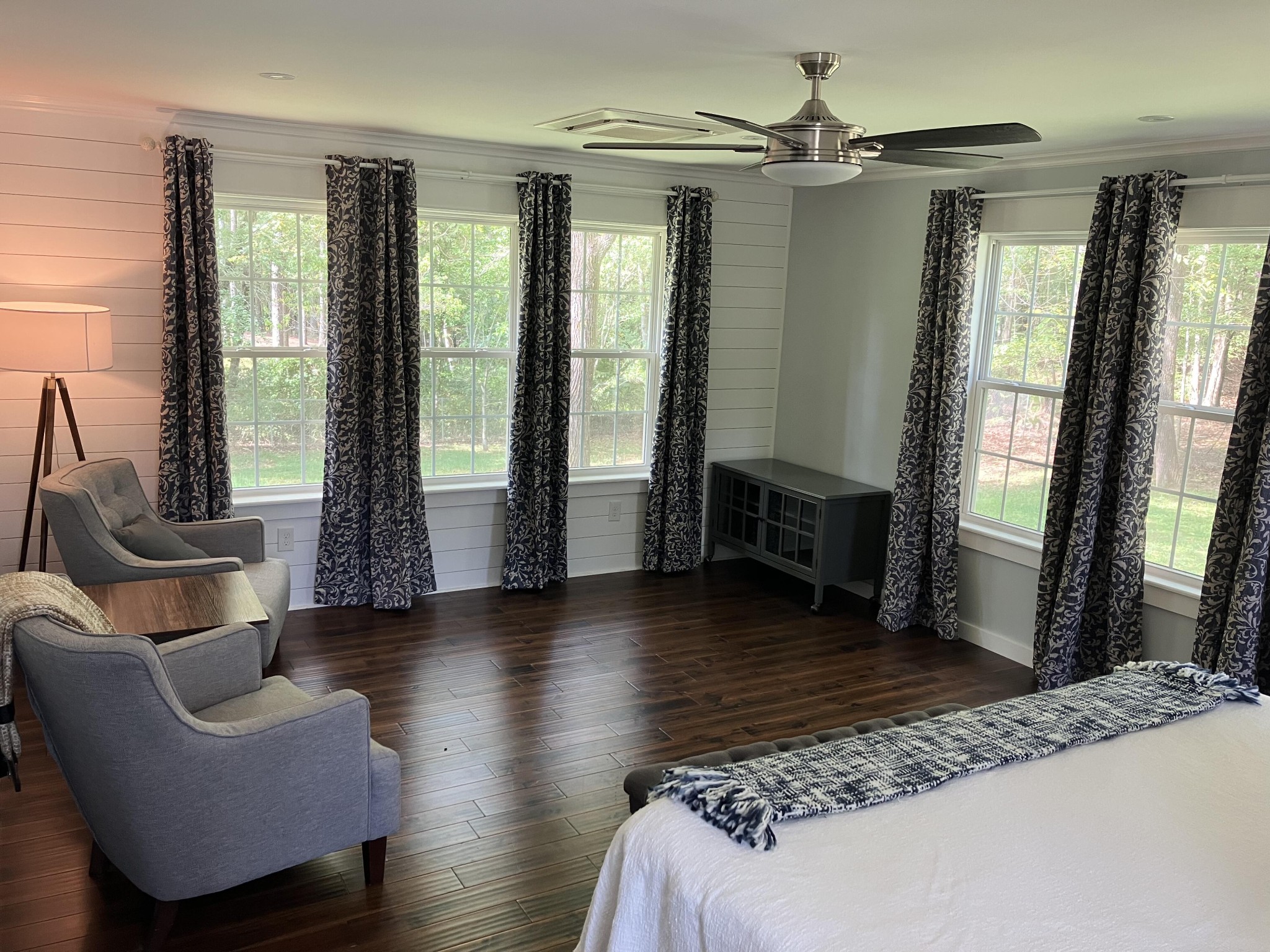 264 Ball Park Road Sewanee, TN 37375 - Photo 45 of 67 a spacious bedroom with a balcony a bed and a couch