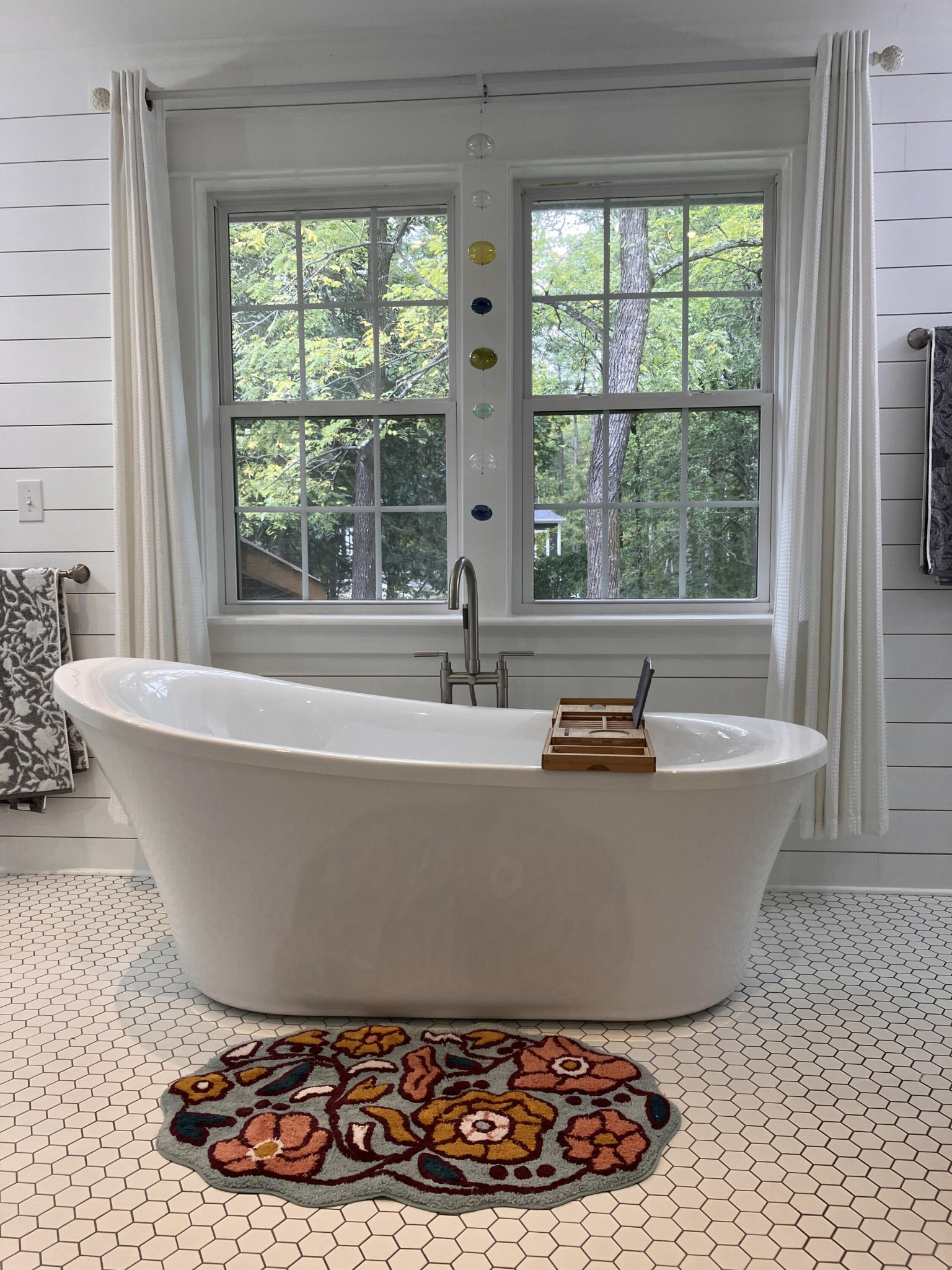 264 Ball Park Road Sewanee, TN 37375 - Photo 49 of 67 a white bath tub sitting in a bathroom next to a window