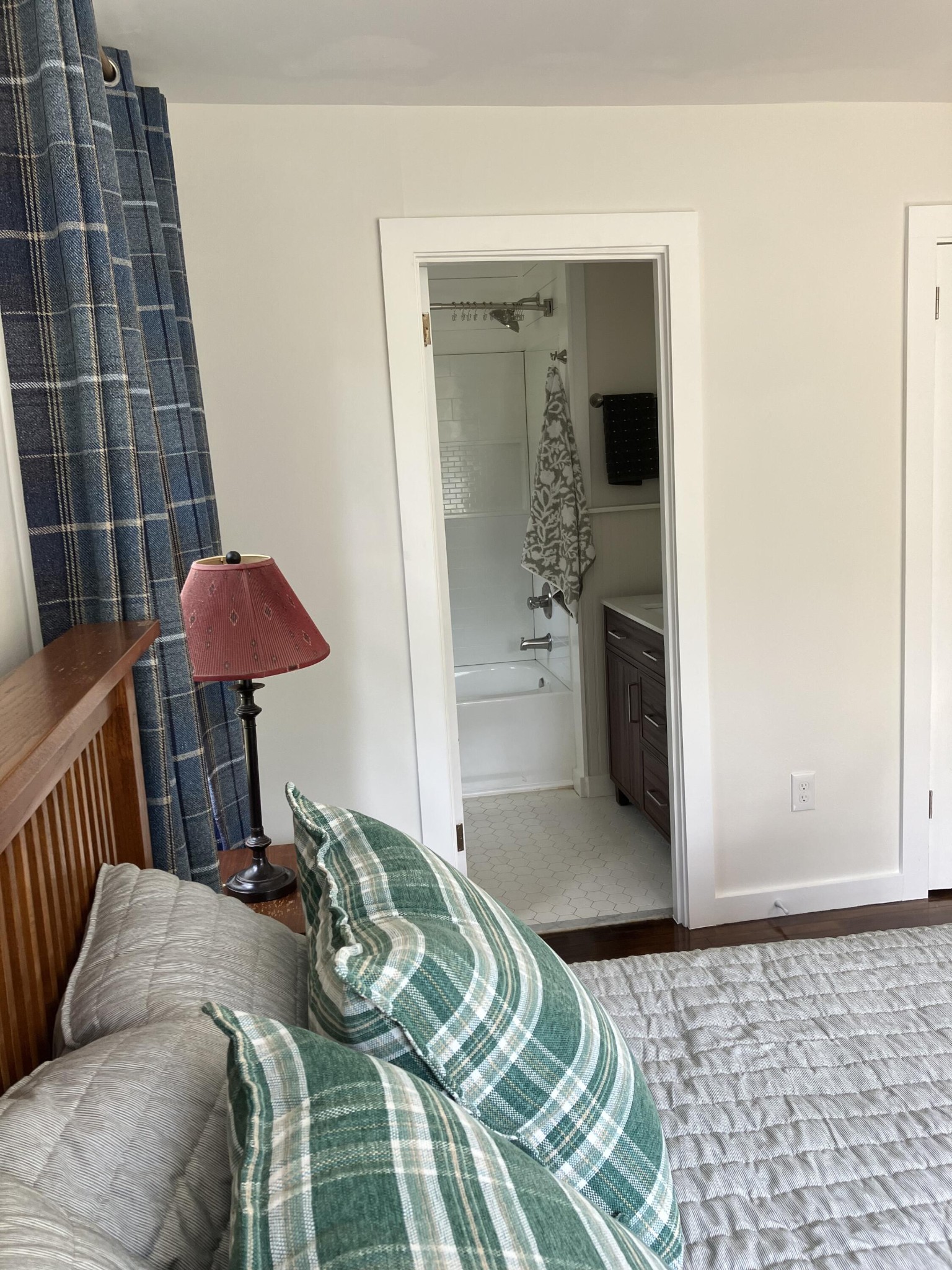 264 Ball Park Road Sewanee, TN 37375 - Photo 56 of 67 a bedroom with a bed and a lamp