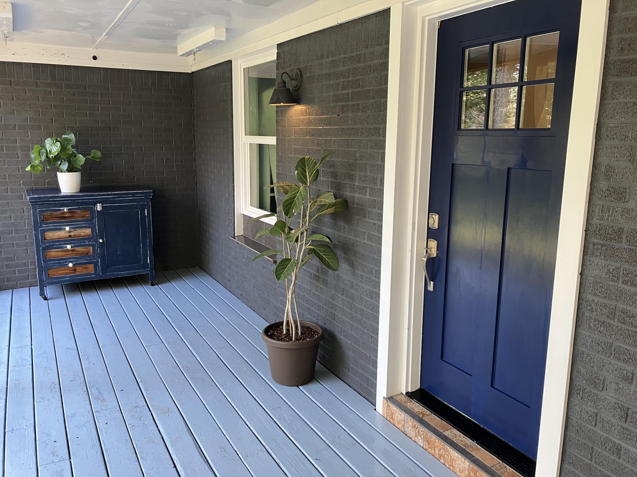 264 Ball Park Road Sewanee, TN 37375 - Photo 8 of 67 a view of a hallway with wooden floor and a potted plant