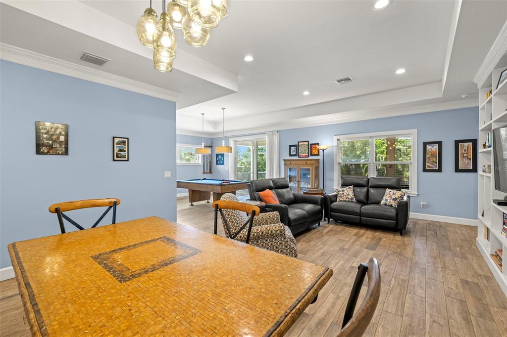 2623 57th Street South Gulfport, FL 33707 - Photo 20 of 50 a living room with furniture and a chandelier