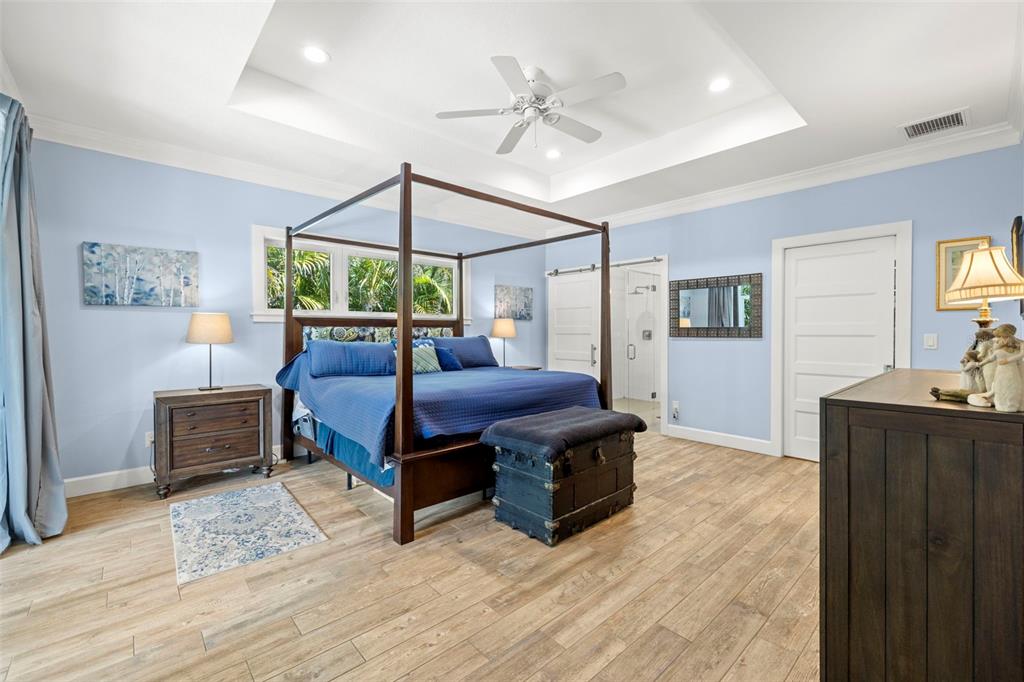 2623 57th Street South Gulfport, FL 33707 - Photo 21 of 50 a bed room with furniture and a window