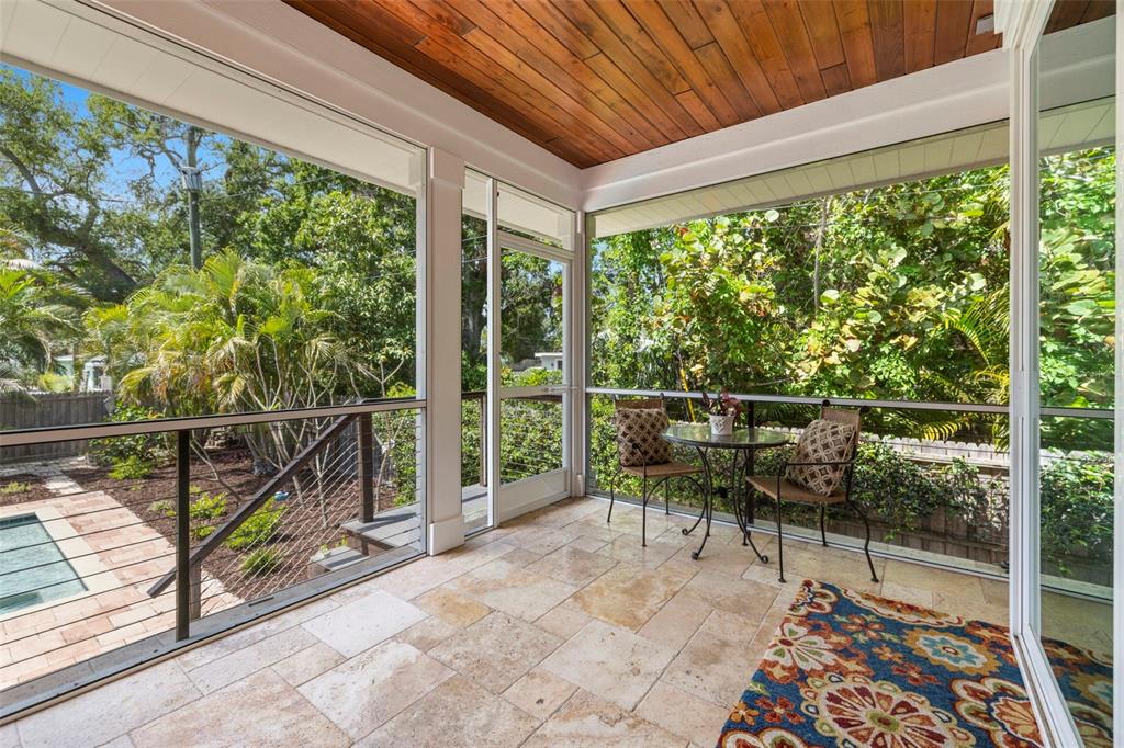 2623 57th Street South Gulfport, FL 33707 - Photo 40 of 50 a view of a chairs and table in the balcony