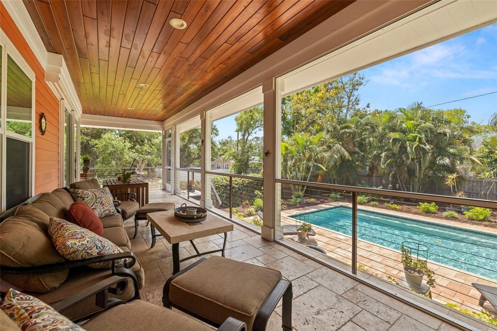 2623 57th Street South Gulfport, FL 33707 - Photo 41 of 50 a living room with furniture and a floor to ceiling window