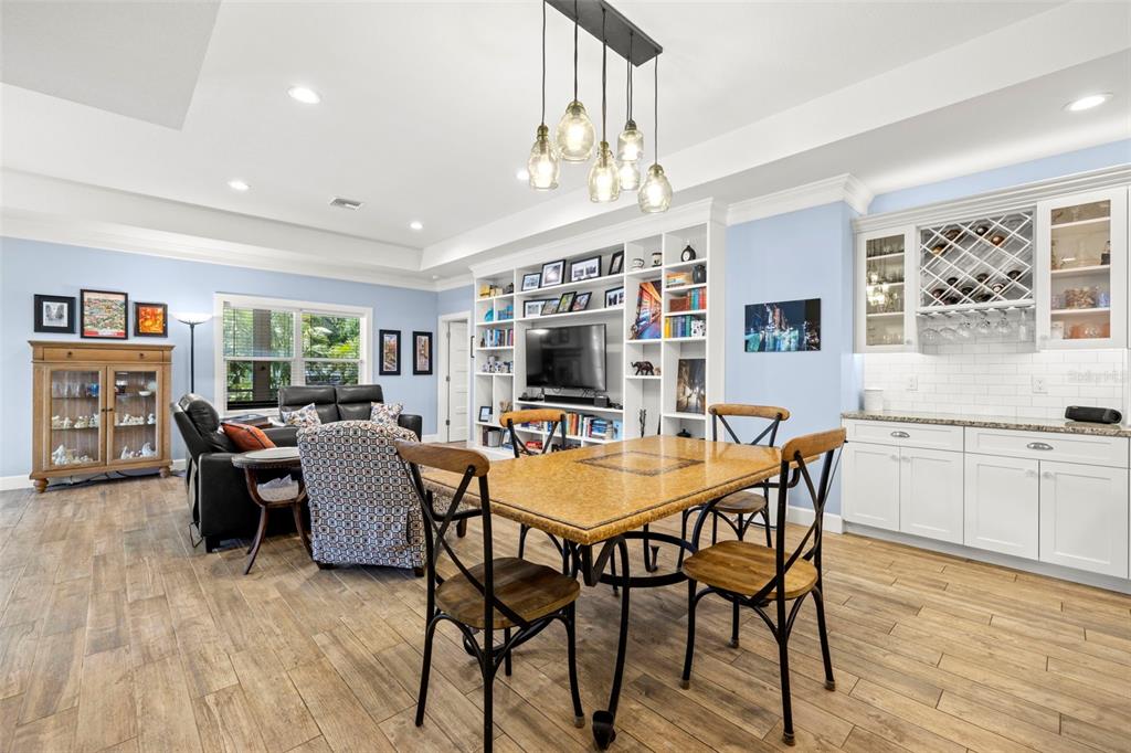 2623 57th Street South Gulfport, FL 33707 - Photo 10 of 50 a view of a dining room with furniture window and wooden floor
