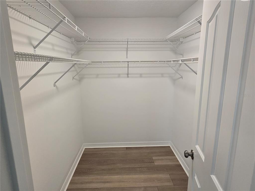 719 Balmoral Court Inverness, FL 34453 - Photo 16 of 29 a view of a room with racks on the wall