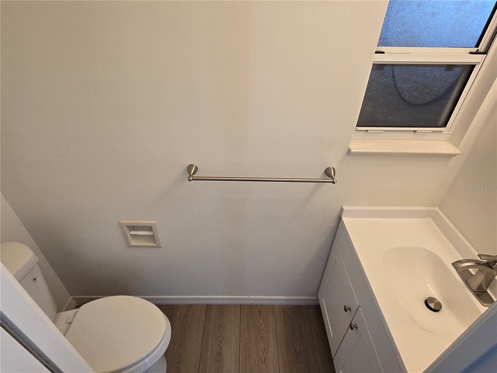 719 Balmoral Court Inverness, FL 34453 - Photo 27 of 29 a bathroom with a sink and a toilet
