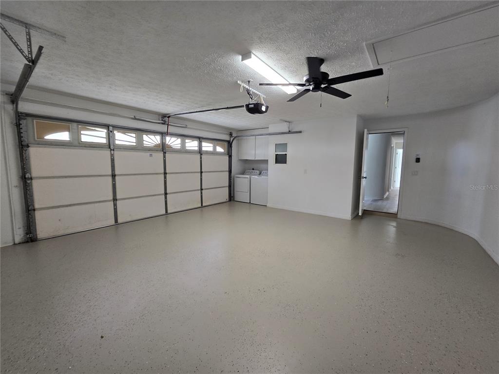719 Balmoral Court Inverness, FL 34453 - Photo 29 of 29 en empty room with windows and ceiling fan