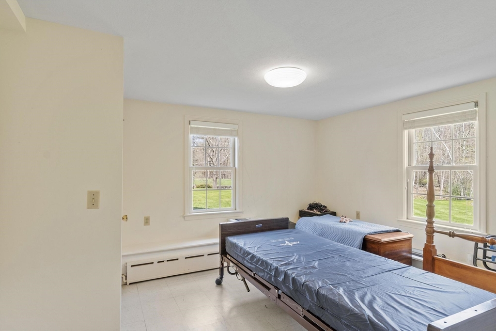 103 Brooks Station Road Princeton, MA 01541 - Photo 35 of 42 a room with a bed and a window