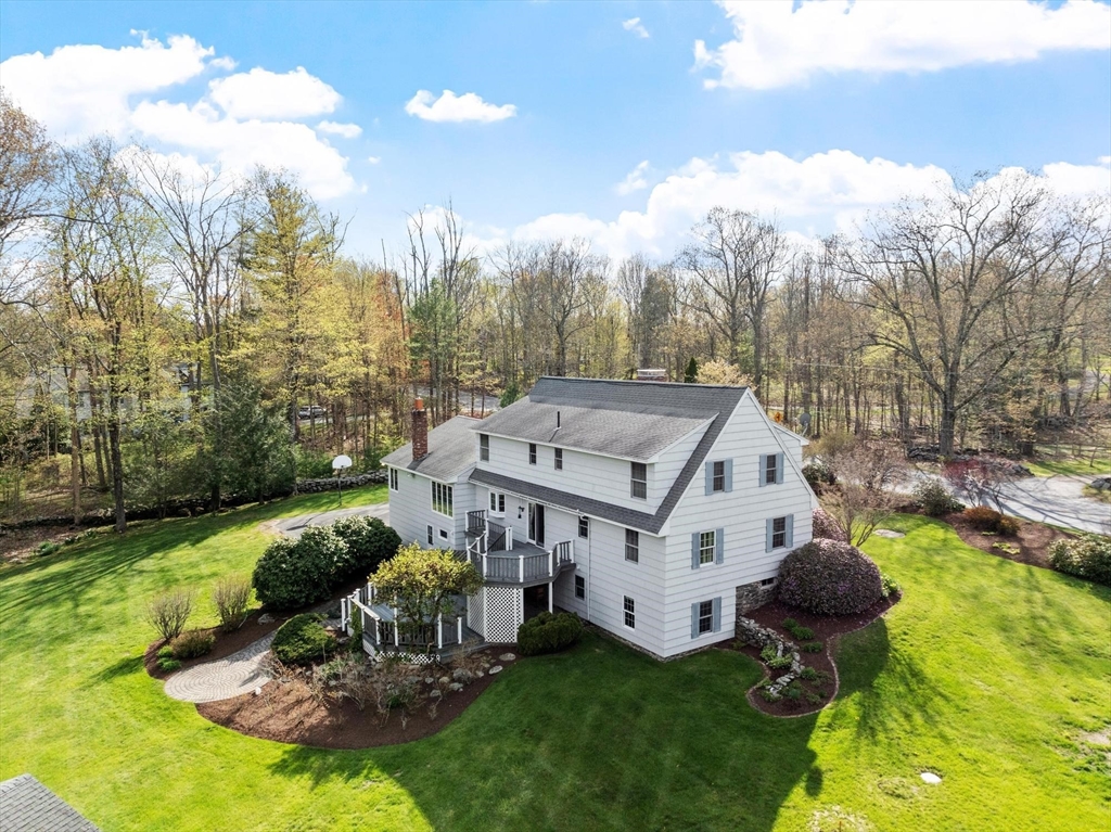 103 Brooks Station Road Princeton, MA 01541 - Photo 40 of 42 a white house with a big yard and large trees