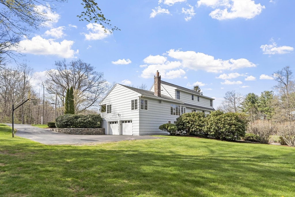 103 Brooks Station Road Princeton, MA 01541 - Photo 4 of 42 a front view of a house with garden