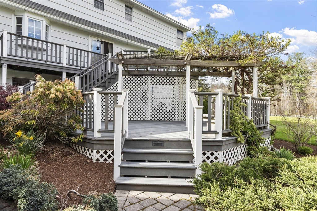 103 Brooks Station Road Princeton, MA 01541 - Photo 6 of 42 a front view of a house with a garage