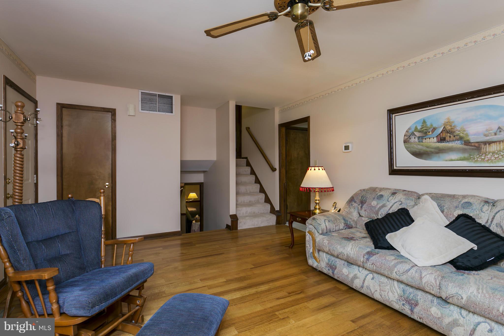 10009 German Road Ellicott City, MD 21042 - Photo 4 of 27 a living room with furniture and wooden floor