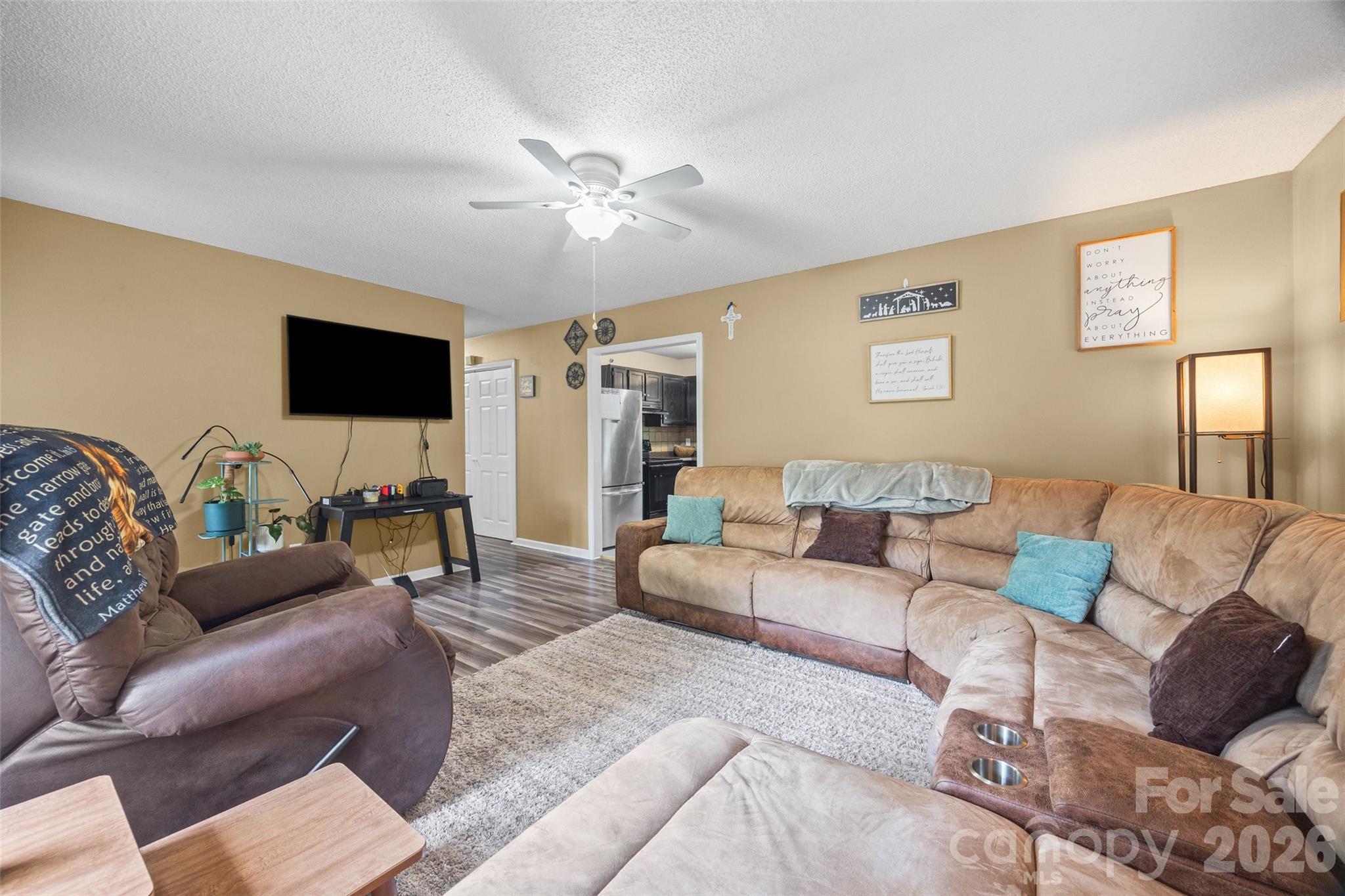30 7th Street York, SC 29745 - Photo 5 of 29 a living room with furniture and a flat screen tv