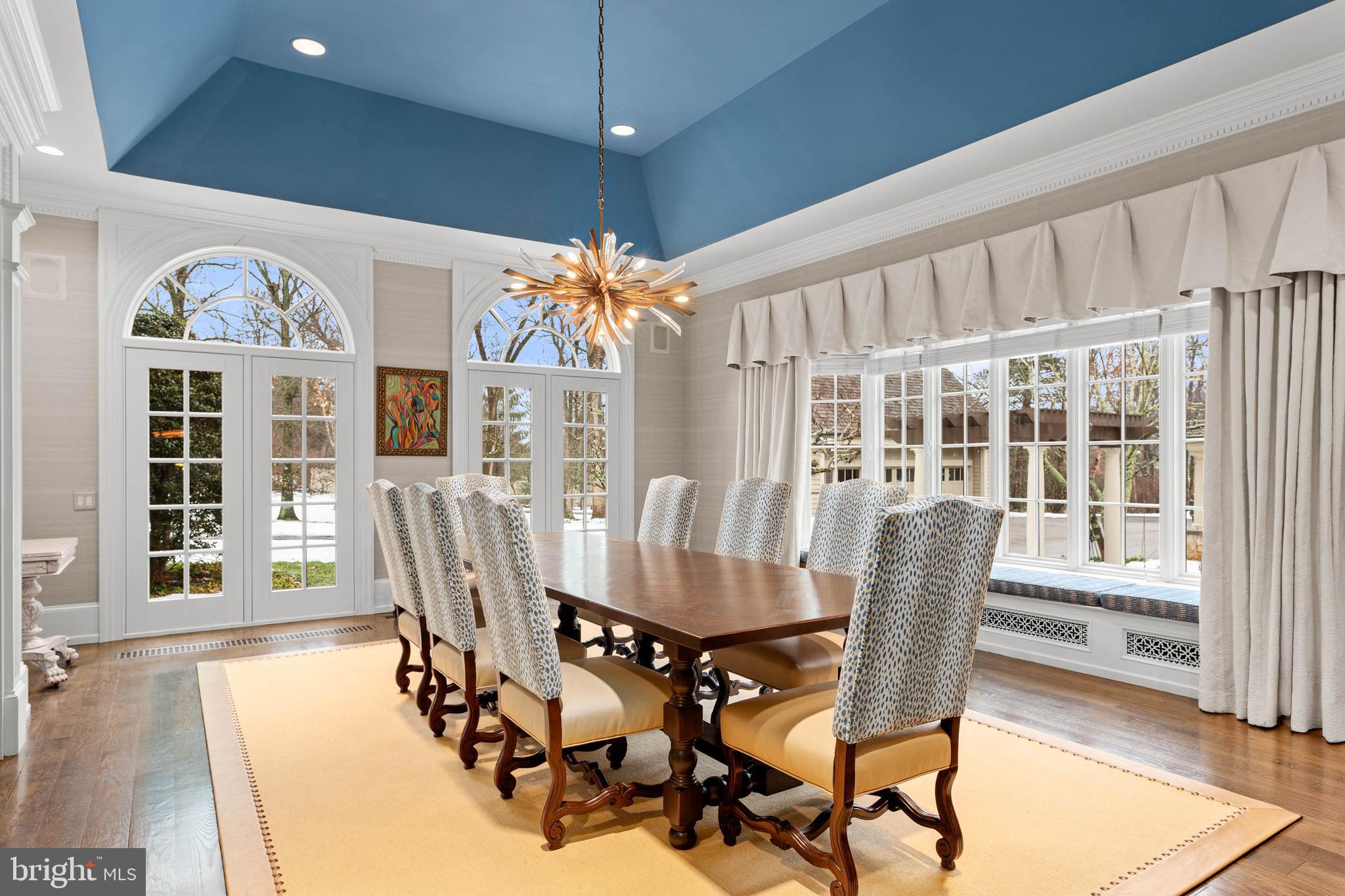1347 Fording Brook Road Lower Gwynedd, PA 19002 - Photo 15 of 82 a view of a dining room with furniture wooden floor and chandelier
