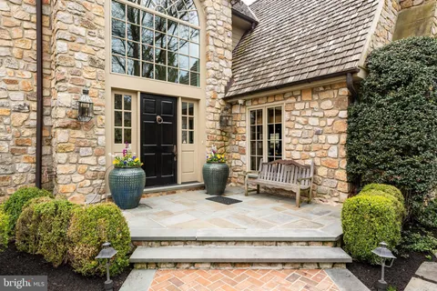 front view of a house with a small yard