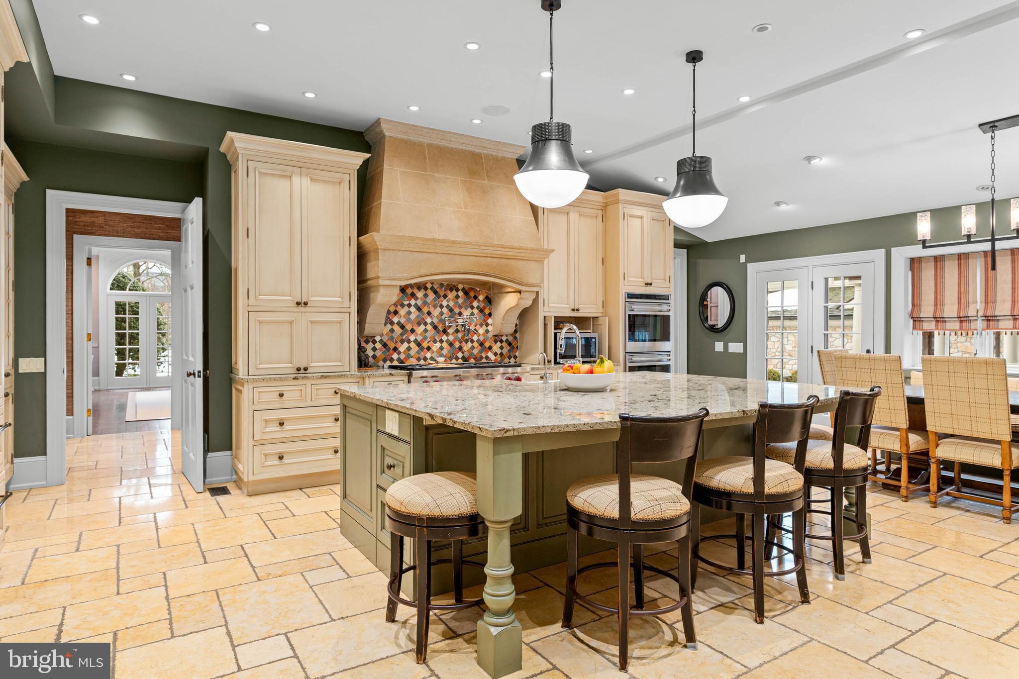 1347 Fording Brook Road Lower Gwynedd, PA 19002 - Photo 25 of 82 a large kitchen with a table and chairs