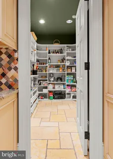 a bathroom with a tub sink and window