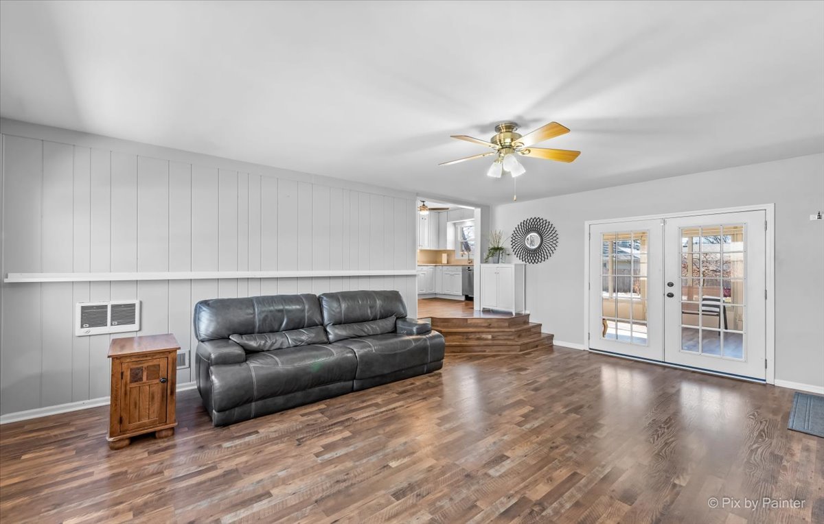 34 Johnathan Road Lake Zurich, IL 60047 - Photo 3 of 27 a living room with furniture and a chandelier