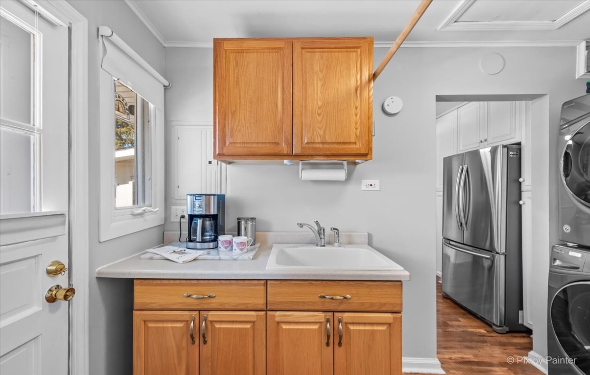 34 Johnathan Road Lake Zurich, IL 60047 - Photo 8 of 27 a kitchen with stainless steel appliances granite countertop a refrigerator and a sink