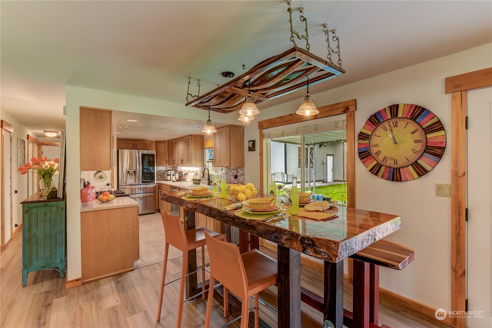 2814 Stafford Way Bothell, WA 98012 - Photo 11 of 38 a dining room with furniture and wooden floor