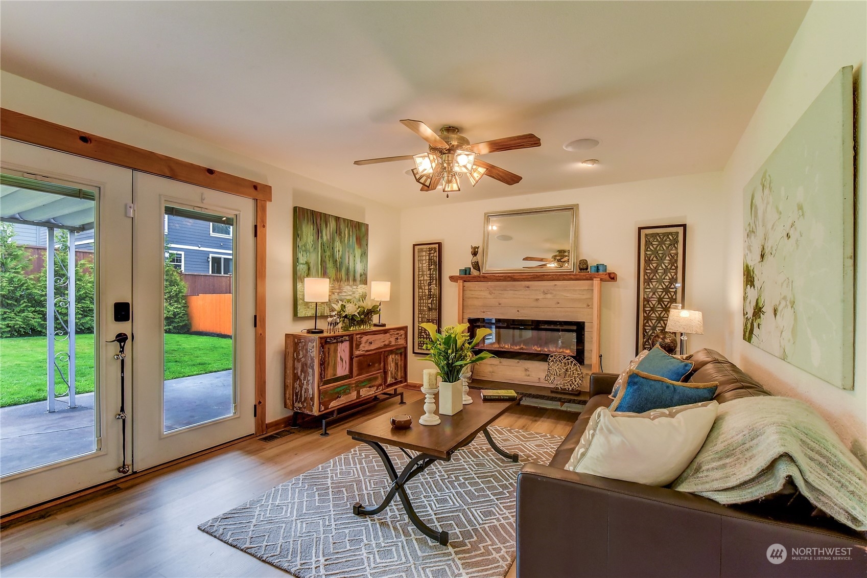 2814 Stafford Way Bothell, WA 98012 - Photo 19 of 38 a living room with furniture and a fireplace