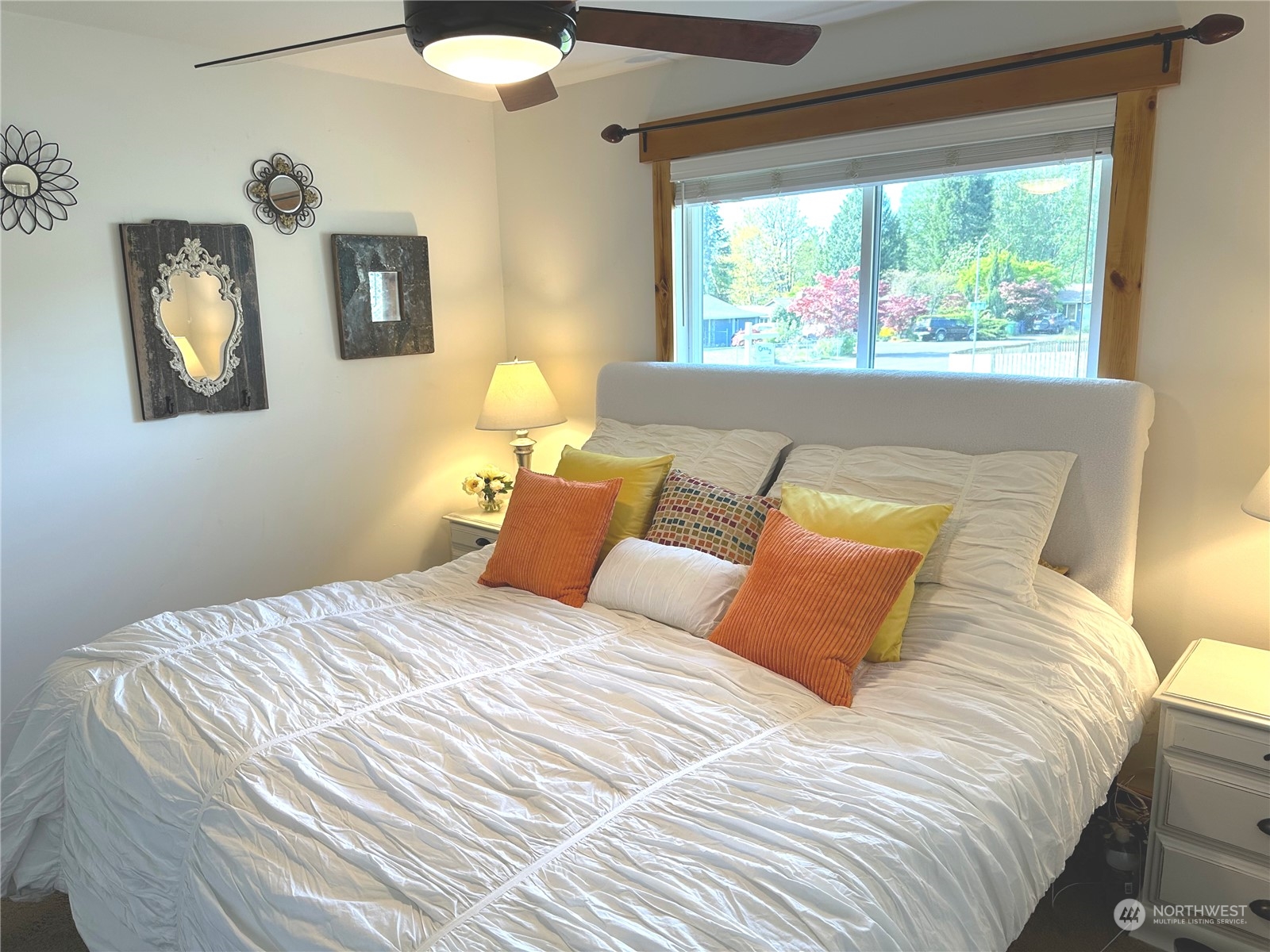 2814 Stafford Way Bothell, WA 98012 - Photo 26 of 38 a bedroom with a bed and a large window
