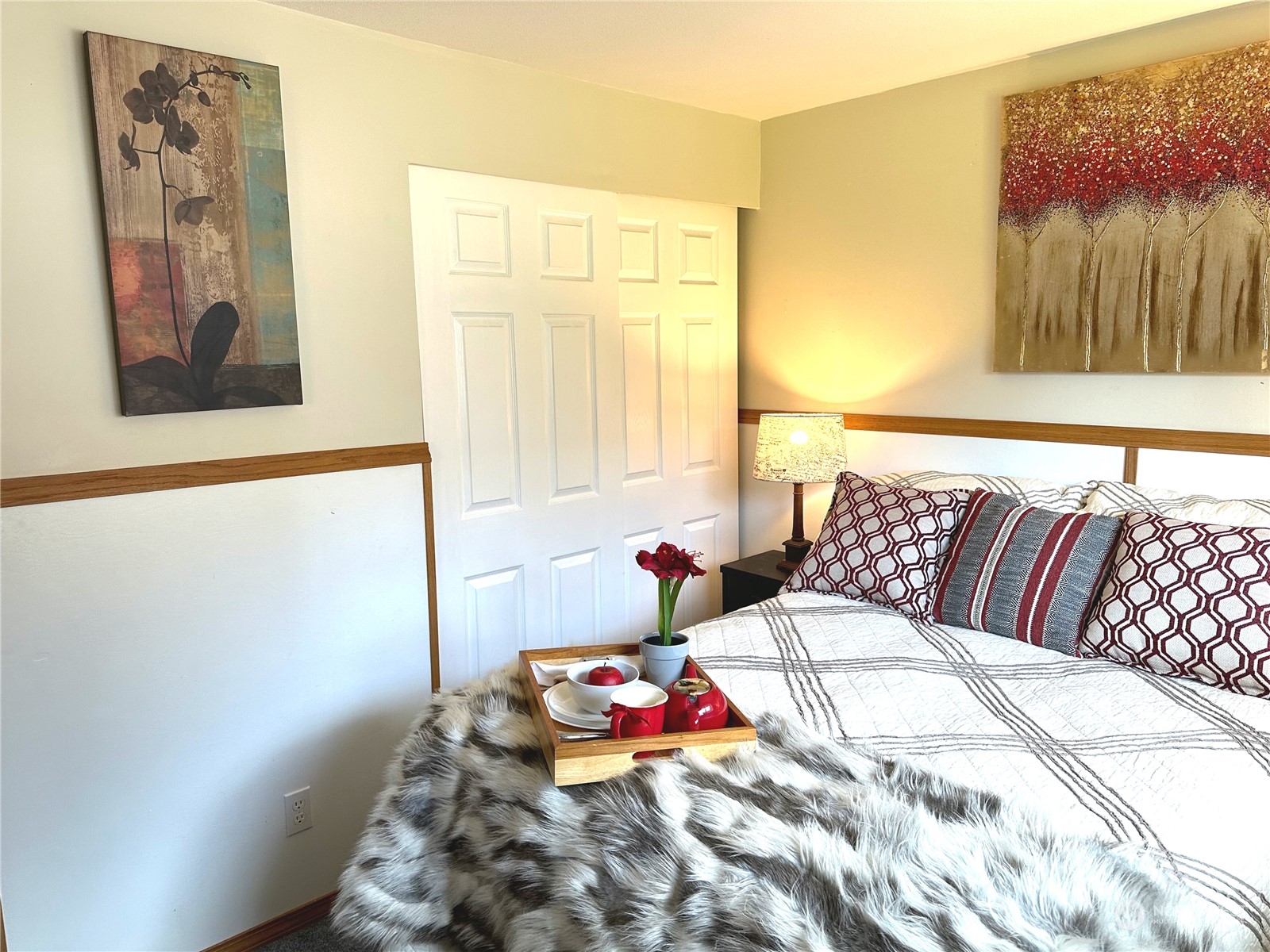 2814 Stafford Way Bothell, WA 98012 - Photo 27 of 38 a bedroom with a bed and cupboard