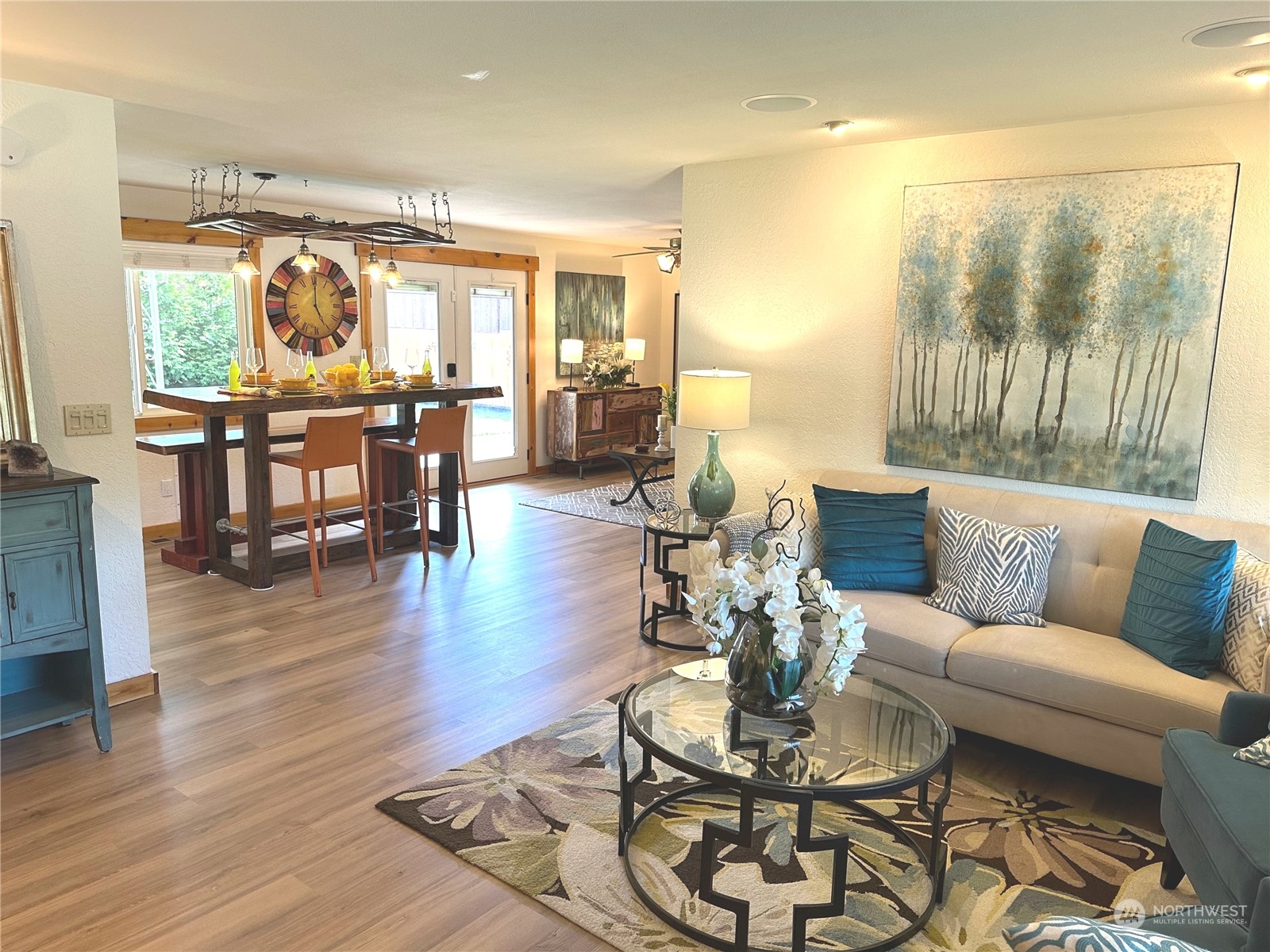 2814 Stafford Way Bothell, WA 98012 - Photo 9 of 38 a living room with furniture wooden floor and a table