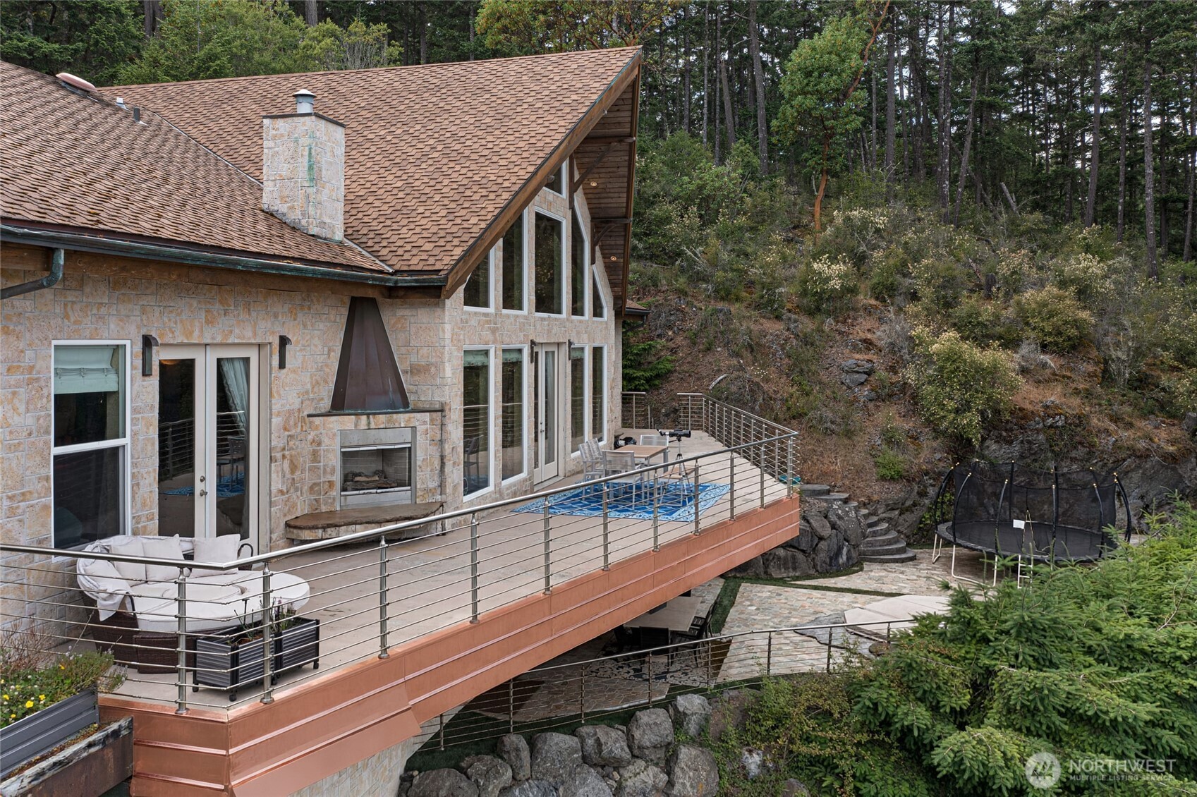 51 Willows Lane Friday Harbor, WA 98250 - Photo 22 of 40 a balcony with table and chairs