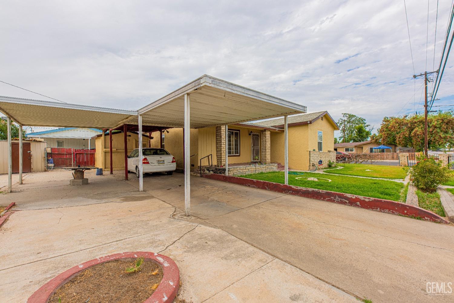 Undisclosed Address Bakersfield, CA 93307 - Photo 3 of 27 a view of a house with entertaining space