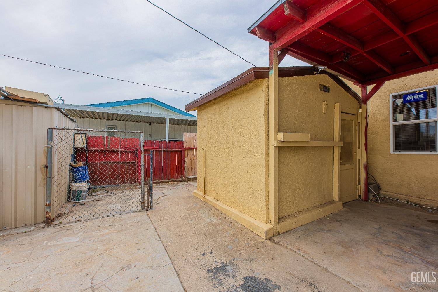 Undisclosed Address Bakersfield, CA 93307 - Photo 6 of 27 a view of a room with wooden walls